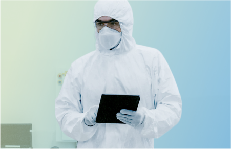 Person wearing full personal protective equipment hazmat suit