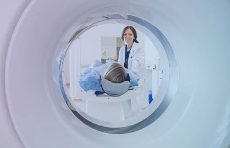 MRI machine with patient and doctor