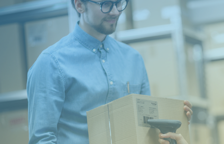 Man scanning box