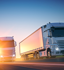 Freight trucks and sunset